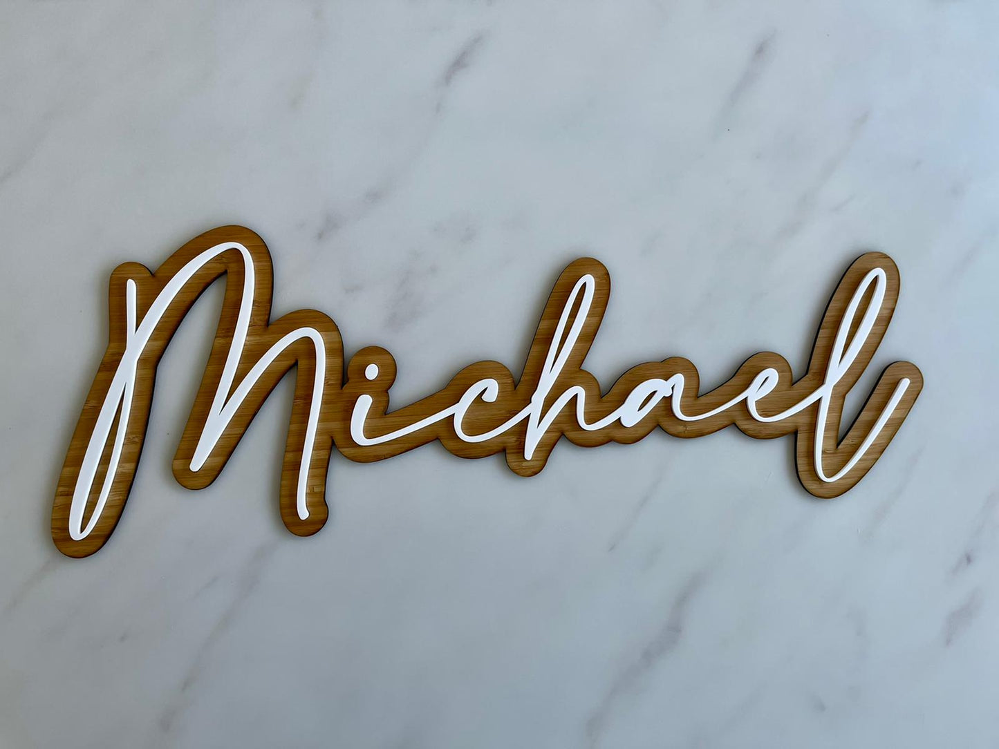Double layered name sign with bamboo base